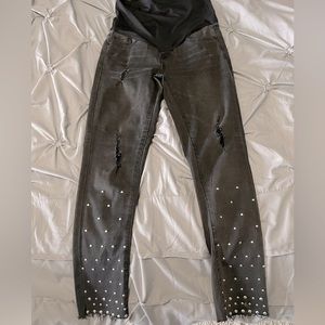 Raw hem • Studded • Slightly distressed • Black maternity jean